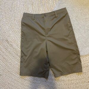 Under armor 20 khaki shorts boy tan uniform athletic 
Excellent condition
